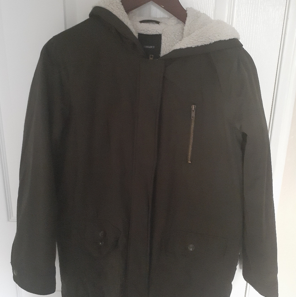 A green long jacket.